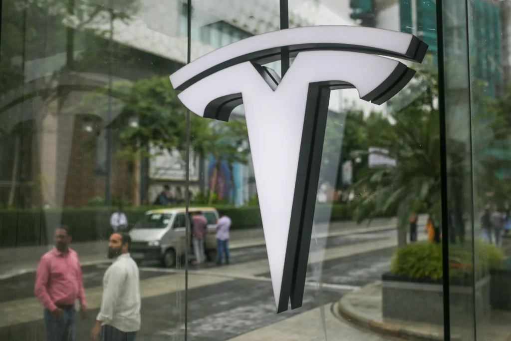 Tesla's Profit Slumps Despite Record EV Sales: What Indian Investors Need to Know