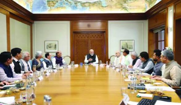Cabinet reshuffle, Indian economy, stock market, government policy, infrastructure, manufacturing, banking, defence, capital markets, economic reforms, FII, investment strategy, market news, India growth, political economy